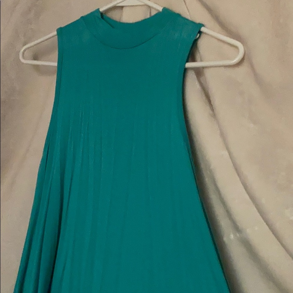 ✨high neck dress💕with a scoop at the bottom💫